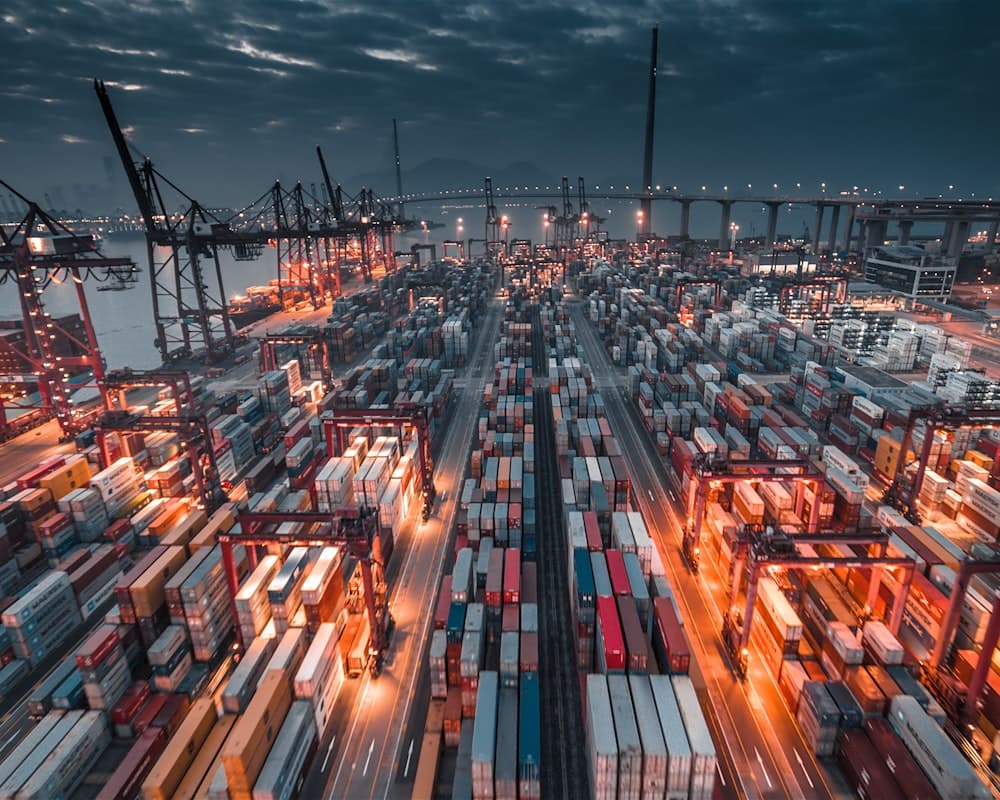 Container port at dusk, representing Magnemo's export bridge to global buyers